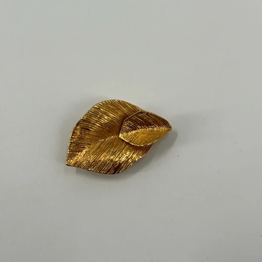 Vintage AMW gold double leaf brooch
